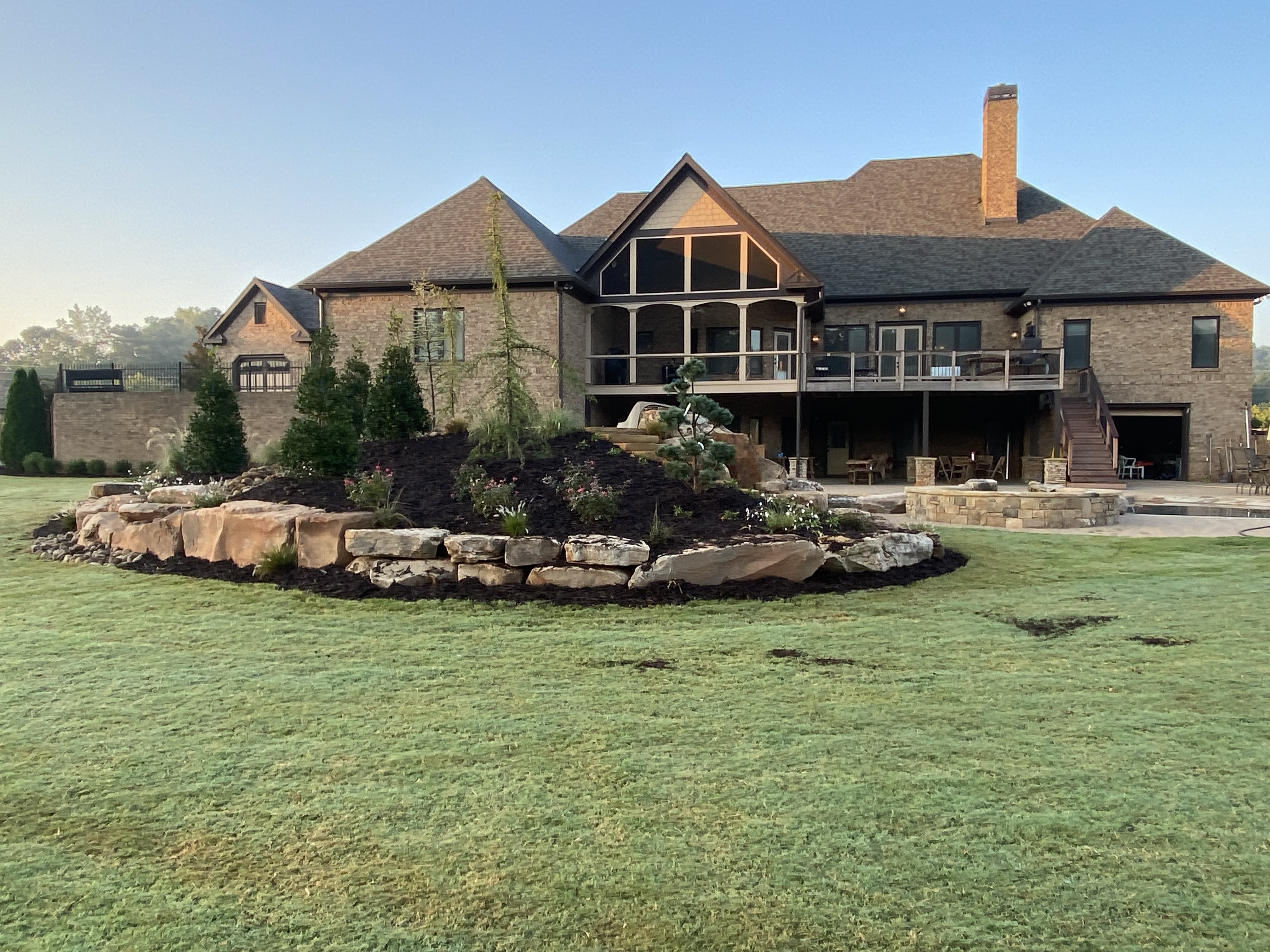 Boulder retaining wall and landscape in Cherokee County, GA