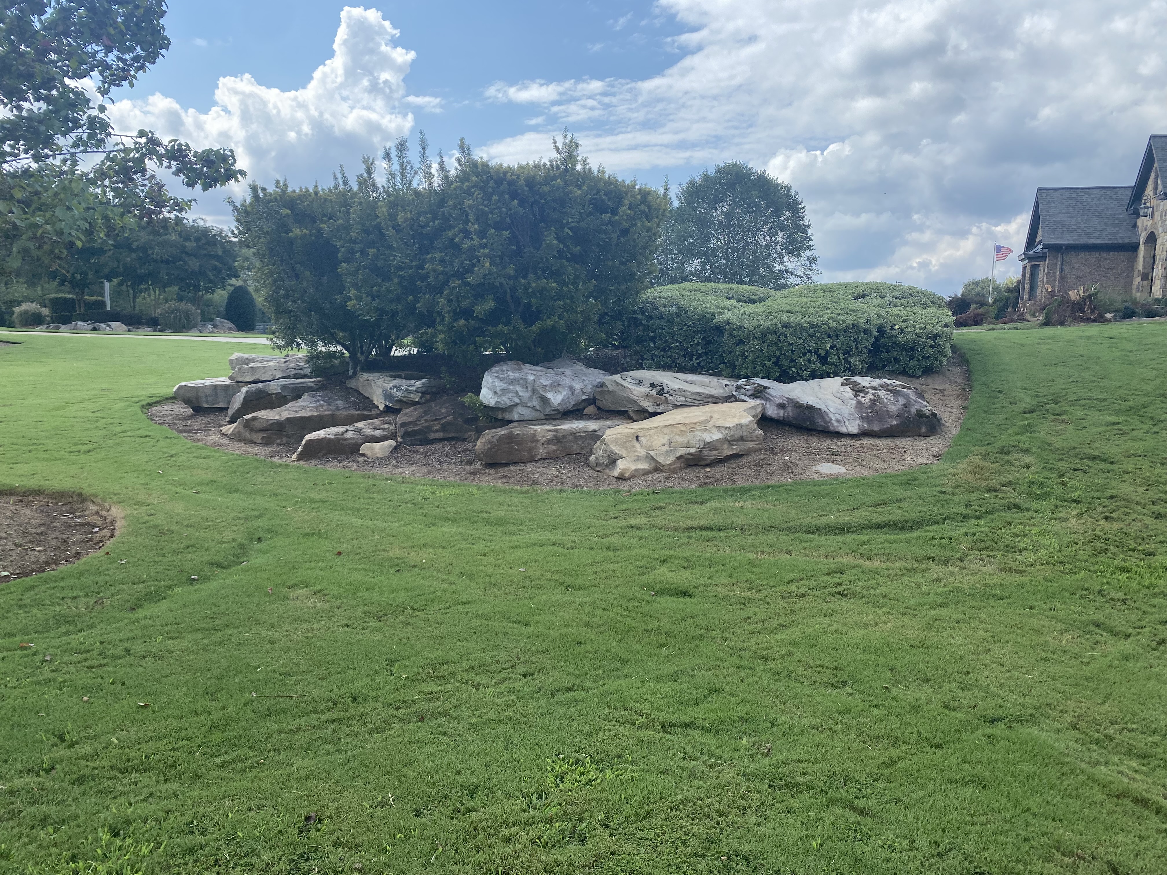 Boulder edging landscape feature in Cherokee County, GA