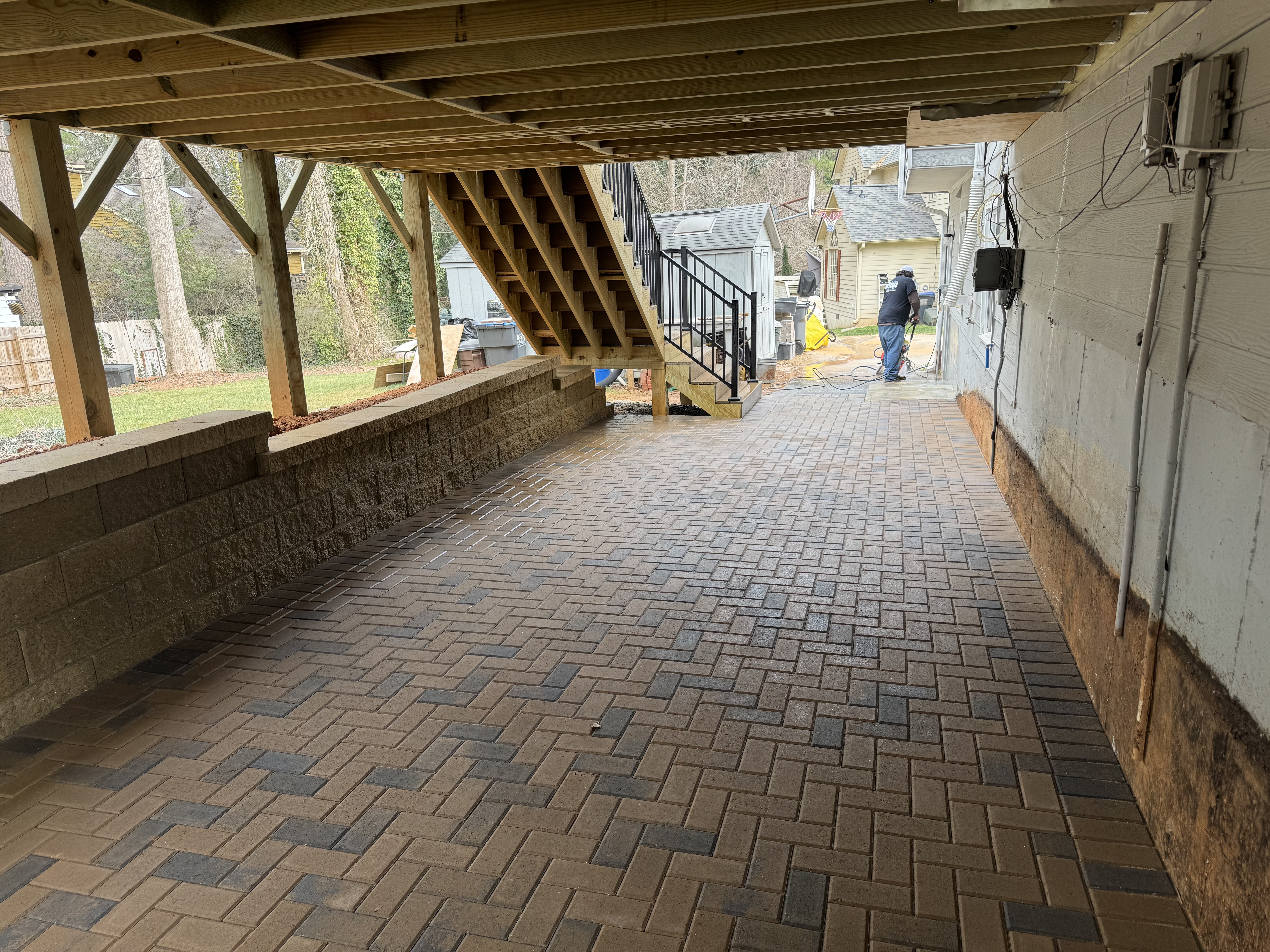 Paver patio installed under deck in Woodstock, GA